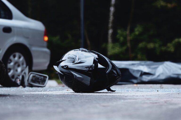 Motorcycle helmet on street after accident